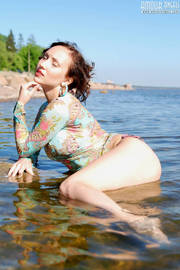 Busty Nude Girl Posing By The Sea