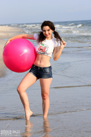 Cute angel on the beach