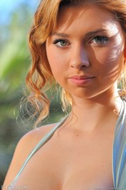 Redhead Girl Mia Wearing An Elegant Dress
